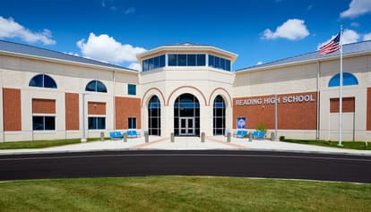 The Reading High School building with cream and tan precast concrete panels.